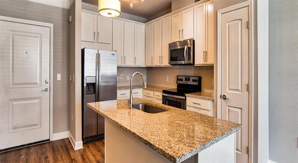 Kitchen wooden cabinets at Eleven 85 Apartments, Atlanta, Georgia