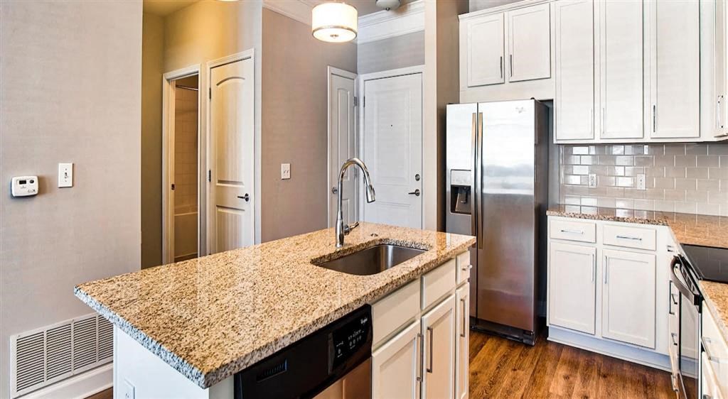 Breakfast bar and cabinets at Eleven 85 Apartments, Atlanta, GA, 30318