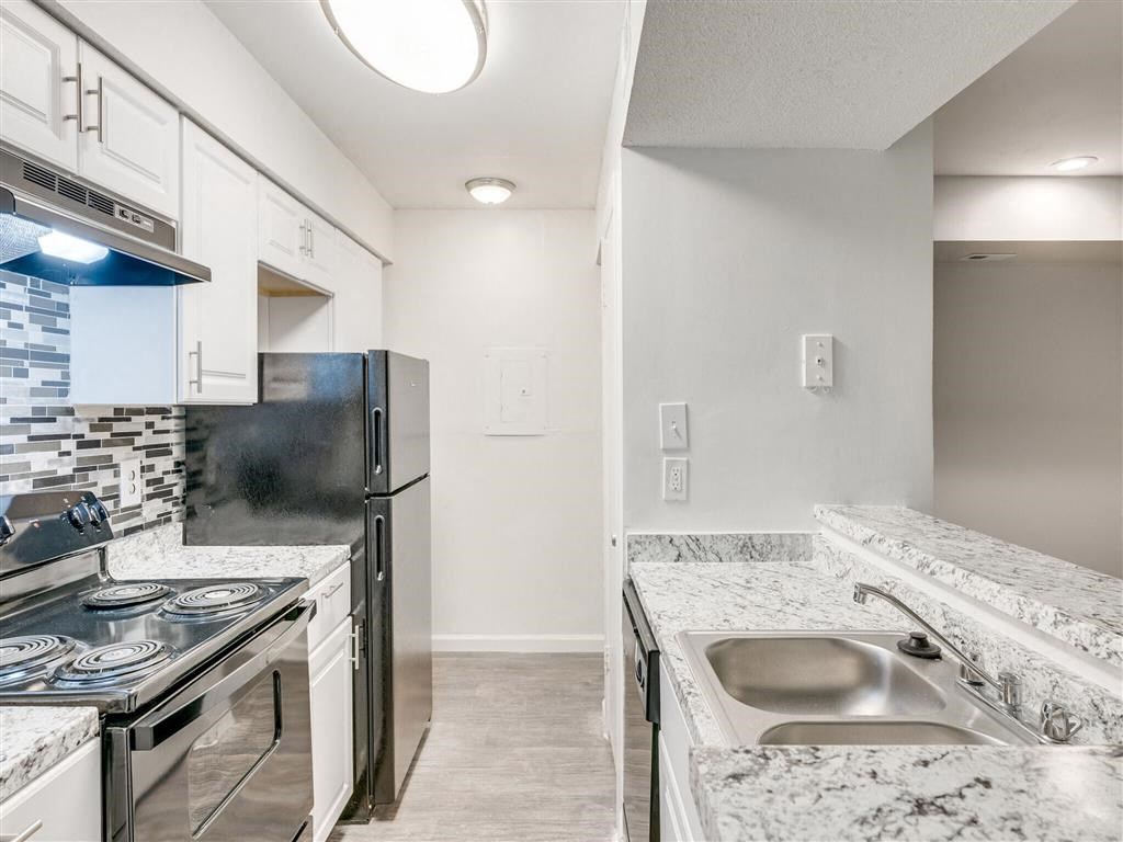 Granite Countertop Kitchen Granite Countertop Kitchen at The Hub at 934 Apartments, Atlanta, GA