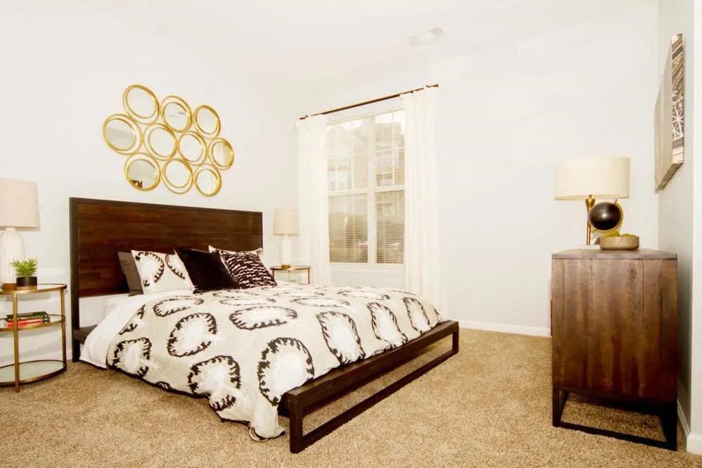 Model bedroom with plush carpet Dakota Mill Creek Buford, GA