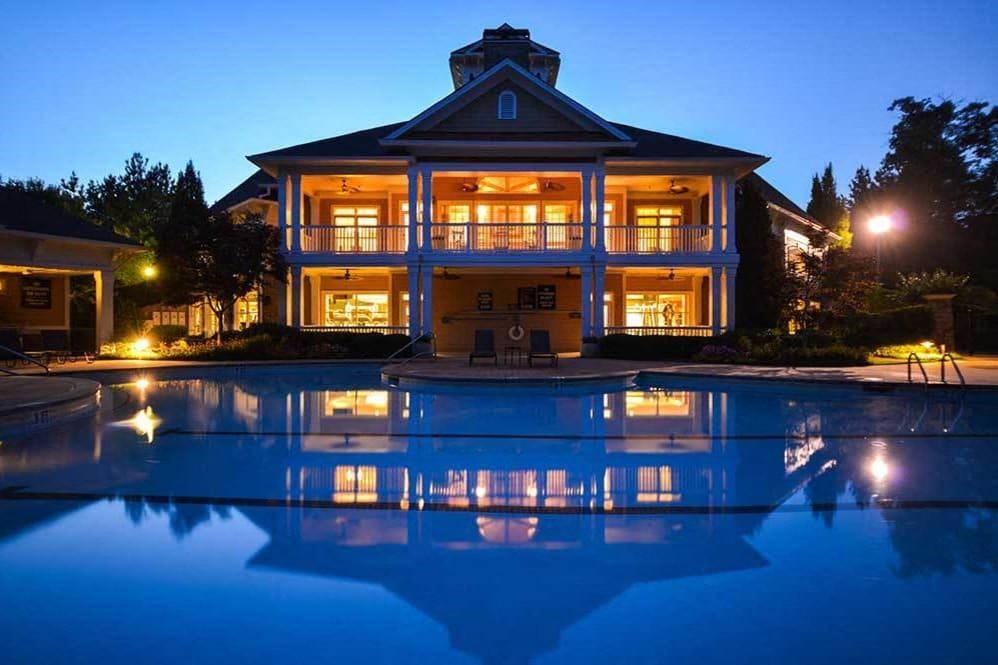 Sparkling pool with sundeck and lounge chairs Dakota Mill Creek Buford, GA