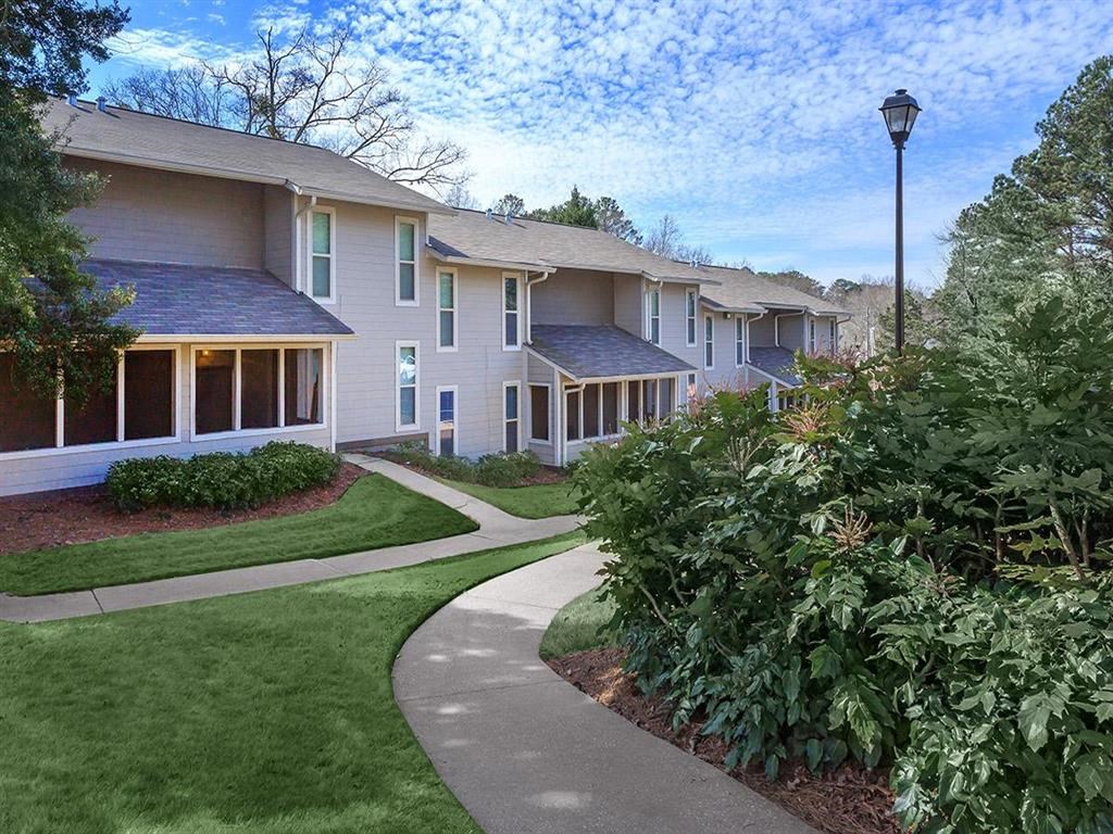 a walkway in front of an apartment complex at The Ellis Apartments, Clarkston, GA