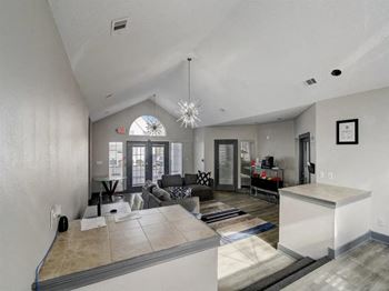 the living room and kitchen of a new home