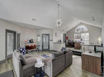 a living room with couches and a table