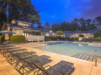 Poolside Relaxing Area at Harvard Place Apartments, Lithonia, GA, 30058 - Photo Gallery 4