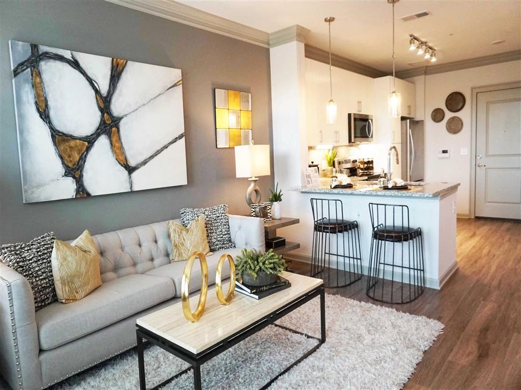 a living room with a couch and a table