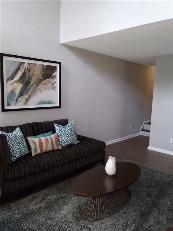 a living room with a couch and a coffee table