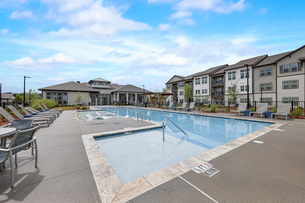 the swimming pool at the estates apartments at Century Mundy Mill Apartments, Oakwood, Georgia