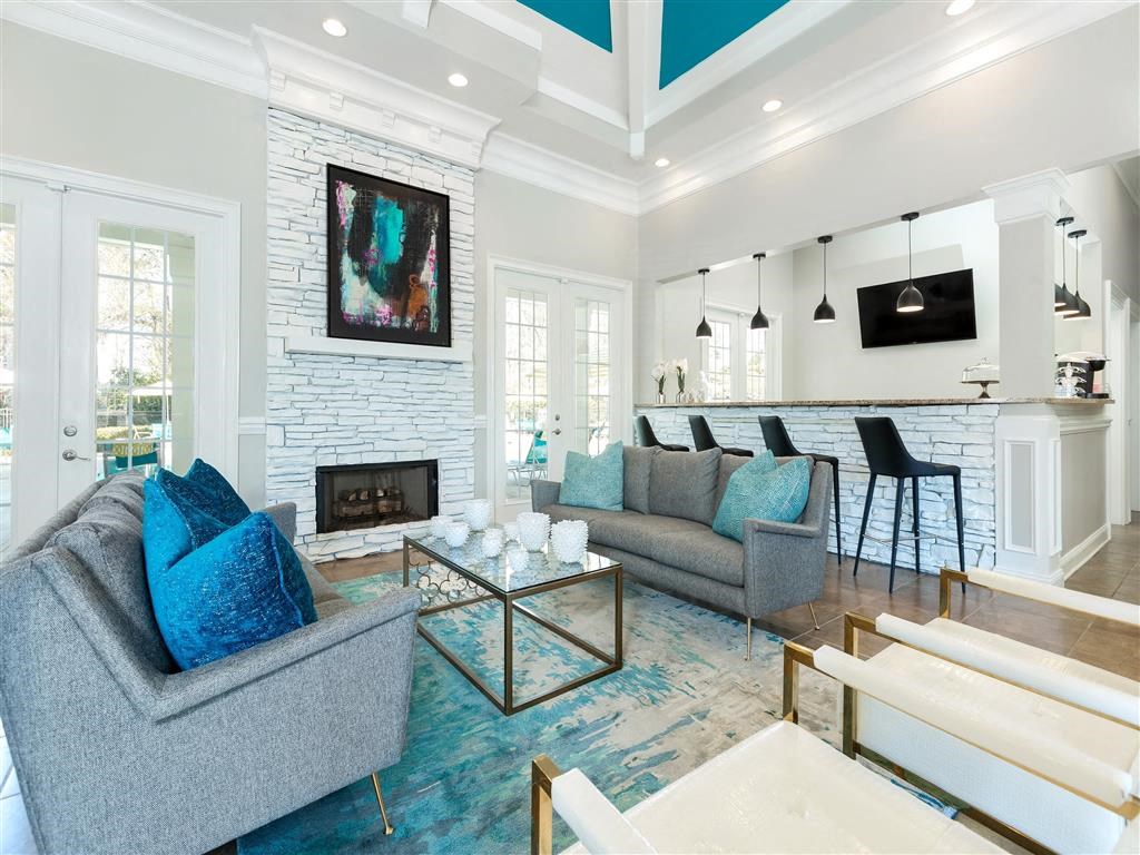 Resident lounge with fireplace at Marbella Place, Georgia