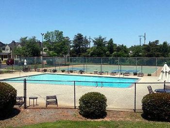 Spacious swimming pool with lounge chairs at the Ascend at Stone Mountain in Stone Mountain, GA