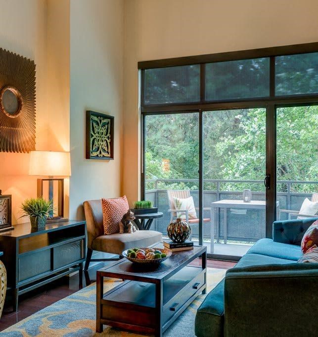 a living room with a couch and a table