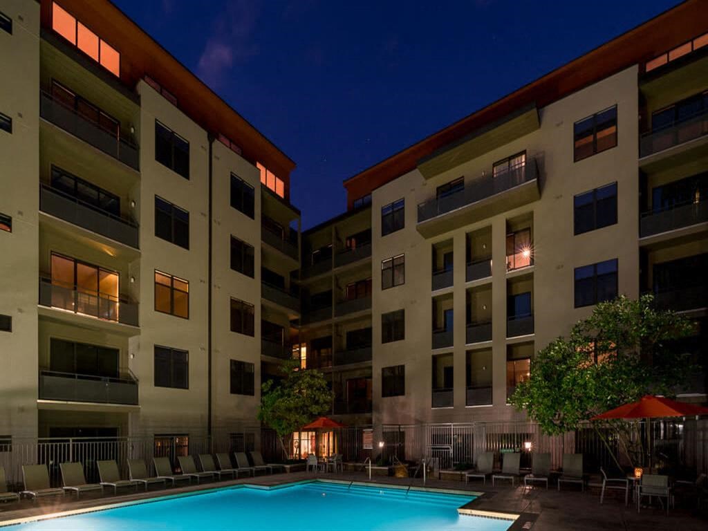 the swimming pool at night at the residence inn