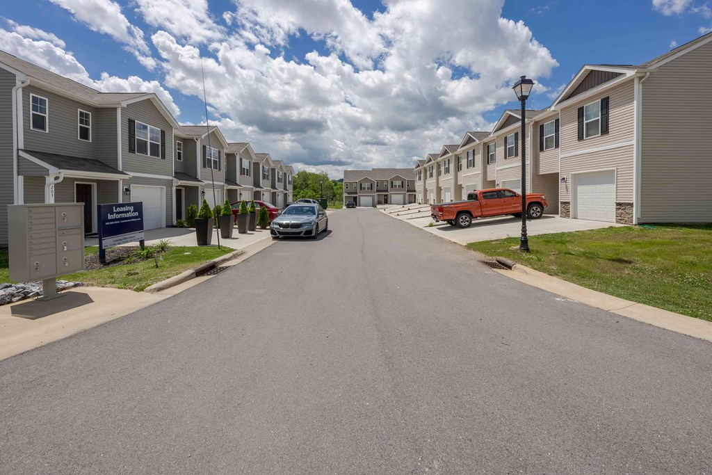 a street with rows of houses on both sides of it
