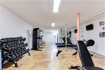 a room filled with lots of exercise equipment  at The Oasis on Cascade, Atlanta, GA, 30310