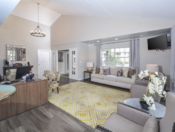 living room with hardwood-style flooring at Harvard Place Apartments, Lithonia, GA, 30058 - Photo Gallery 36
