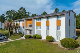 exterior view at the whispering winds apartments in pearland, tx