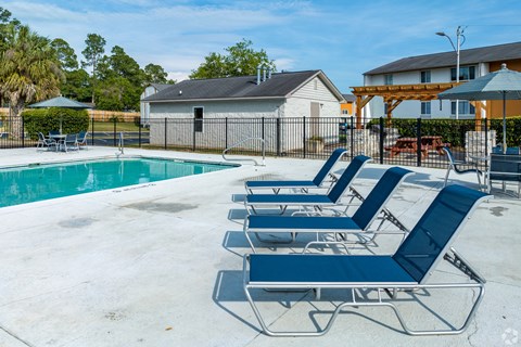 the pool at the whispering winds apartments in pearland, tx at Summit Augusta, Georgia