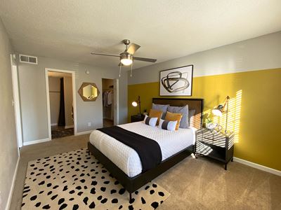 Bedroom with carpet and lights at Latitude at Riverchases