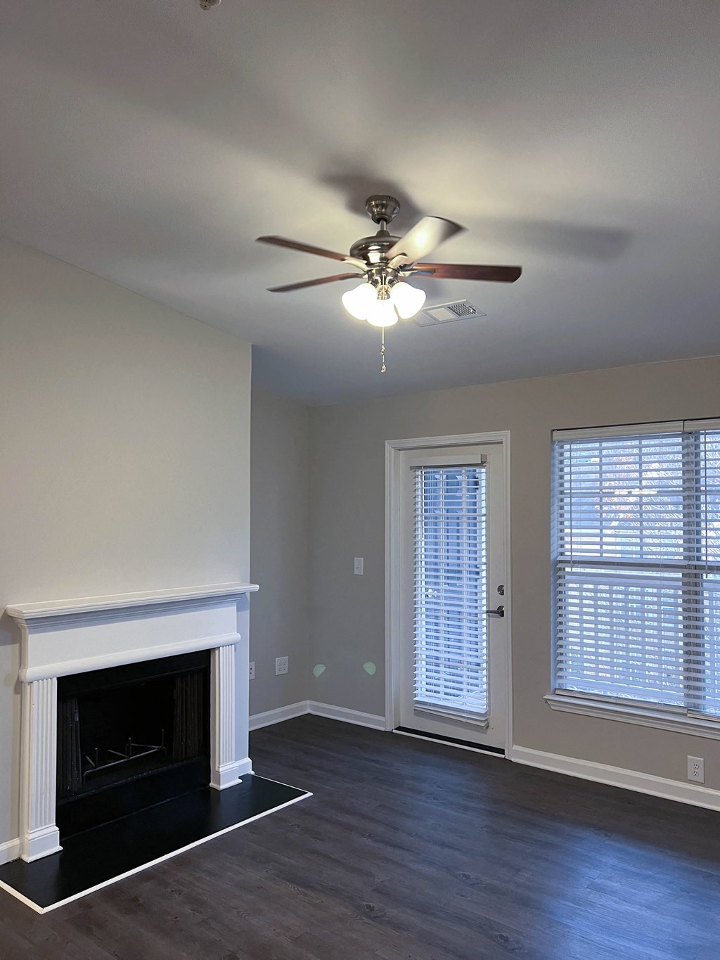 Living room with fireplace and front door Dakota Mill Creek Buford, GA