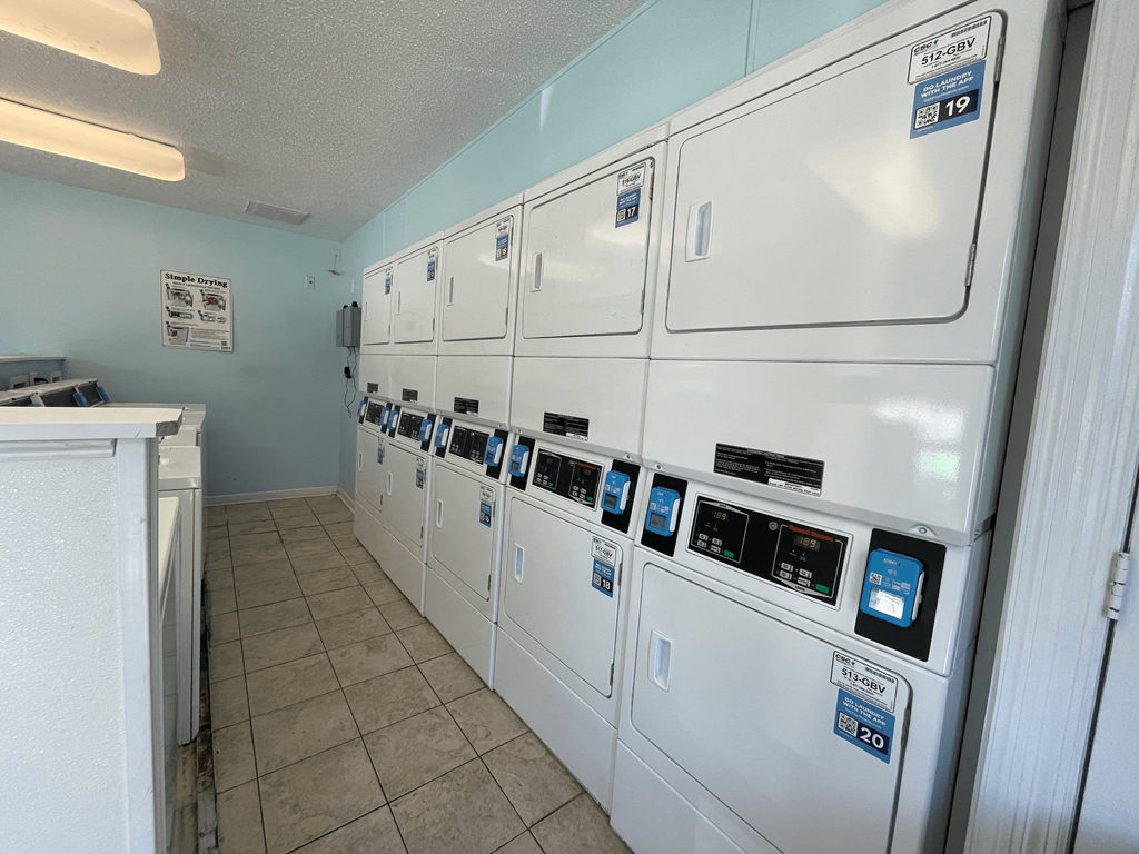 On site laundry facility with full size washewr and dryers at Lakewood Lodge, Hanahan, SC