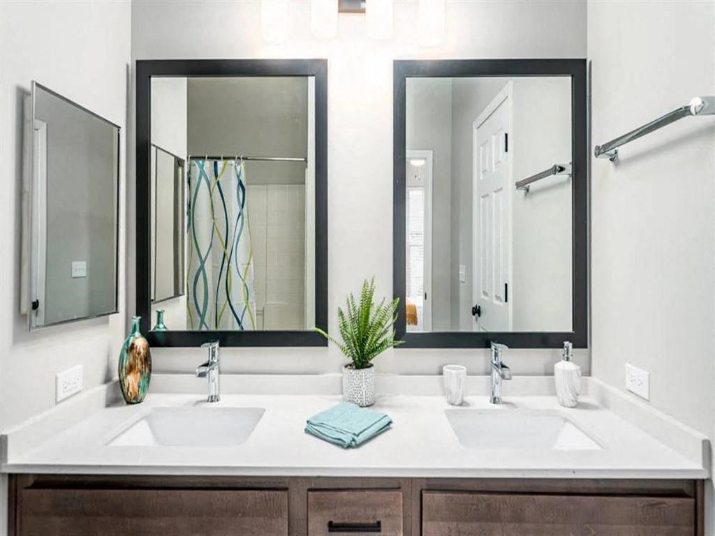 Renovated Bathrooms With Quartz Counters at Elevate on Main, Granger, IN
