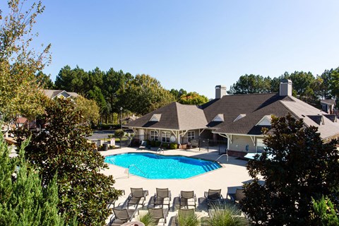 a large swimming pool in front of a house at Indigo Apartments Gainesville, Gainesville, GA 30504