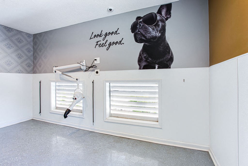 a bathroom with a dog on the wall at Emery Village, Georgia, 30504
