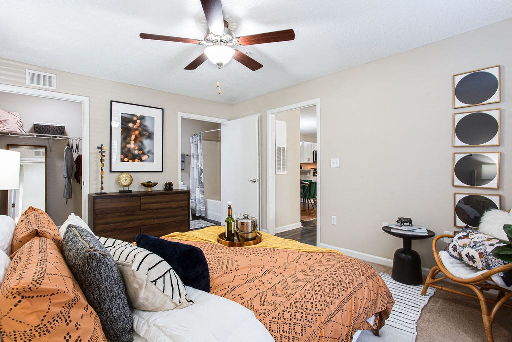 a bedroom with a bed and a ceiling fan at Emery Village, Georgia, 30504