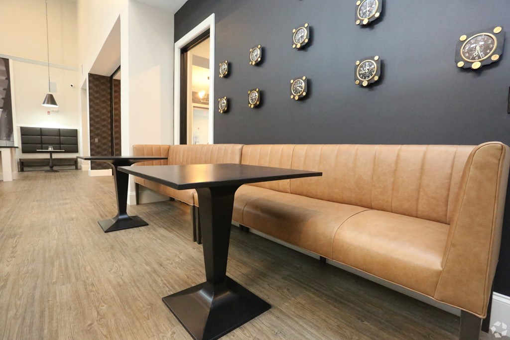 a living room with a couch and a table at Century Baxter Avenue, Kentucky, 40204