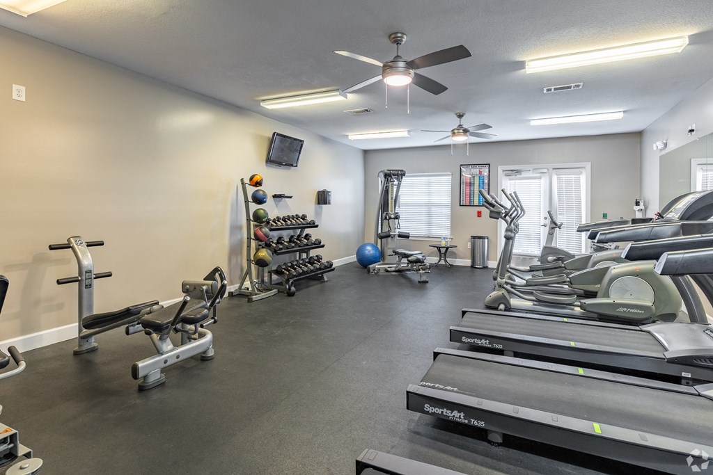 the gym at the whispering winds apartments in pearland, tx