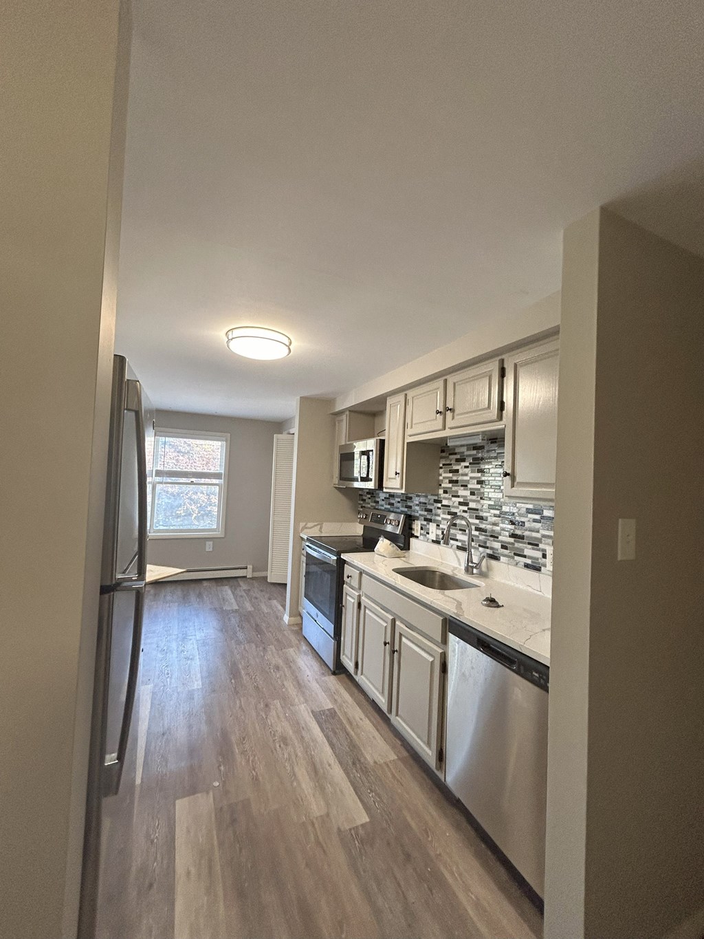 Large renovated kitchen at Briarcliff at Quechee Apartments, Vermont, 05059