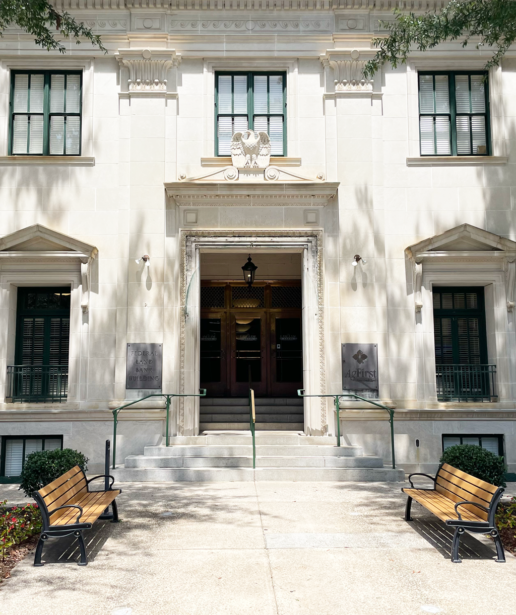 a building with two benches in front of it