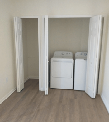 a laundry room with a washer and dryer at The Essex, Altamonte Springs, FL, 32701