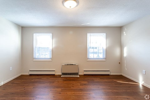Bedroom and living at Summit Terrace at Woodland Apartments, Cape Elizabeth, ME, 04107