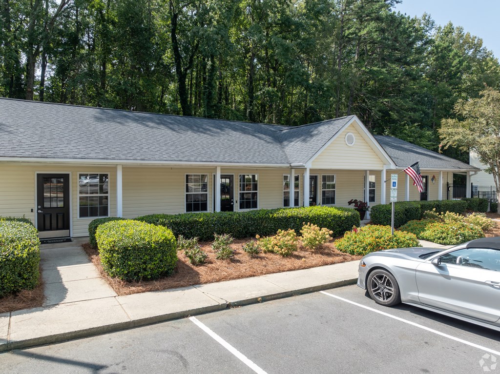 a house with a car parked in front of it