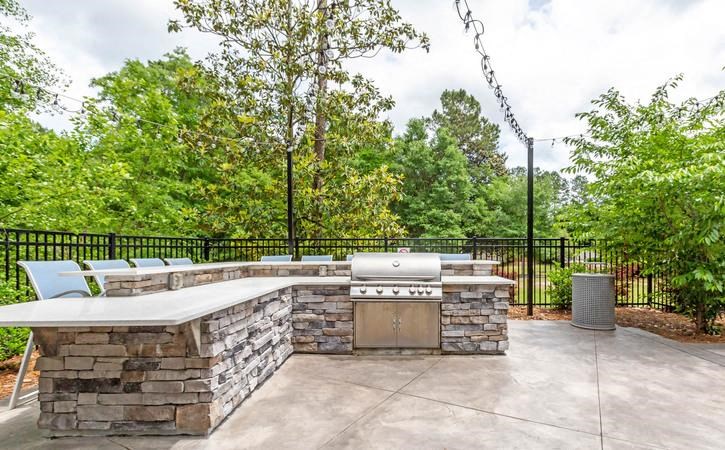Outdoor grilling station at Oasis at Twinwood in Wilmington, NC
