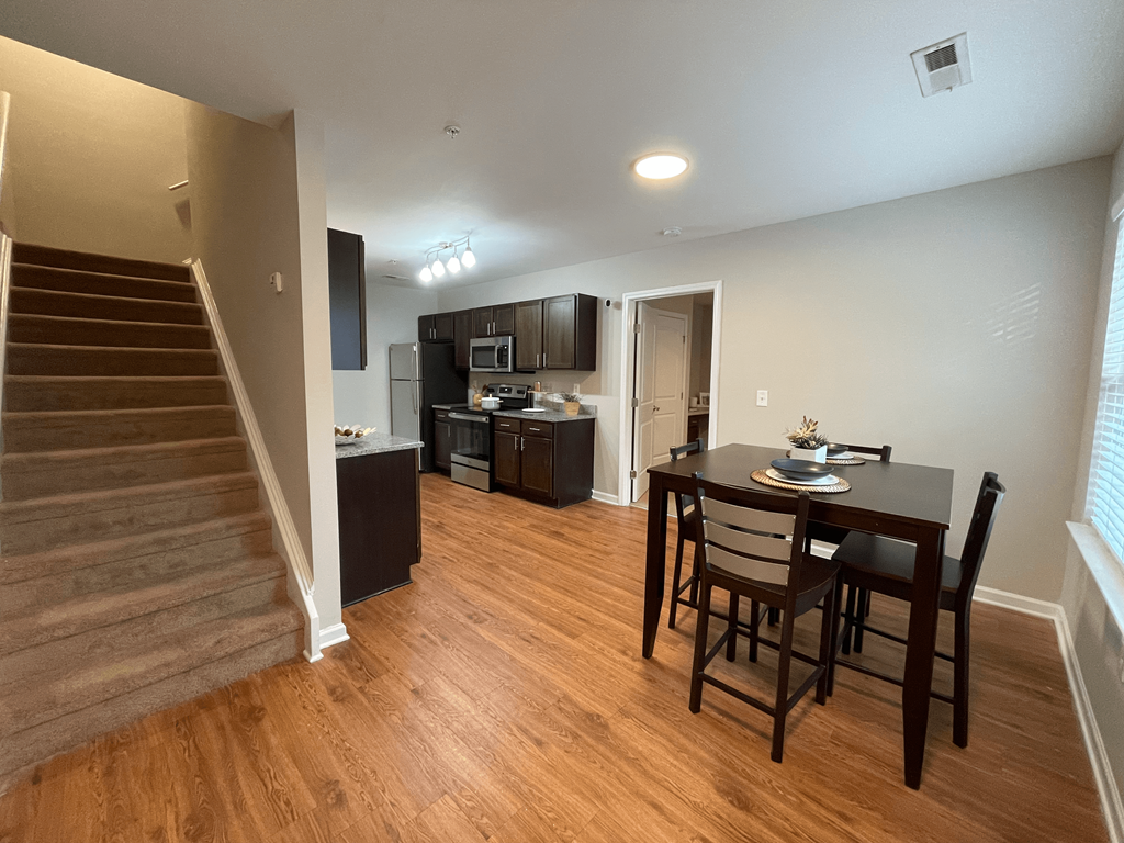 Townhouse entry and dining area at Oasis at Cedar Branch in Wilmington, NC