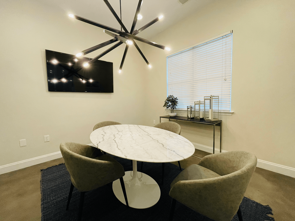 Conference room Conference room at Oasis at Cedar Branch in Wilmington, NC