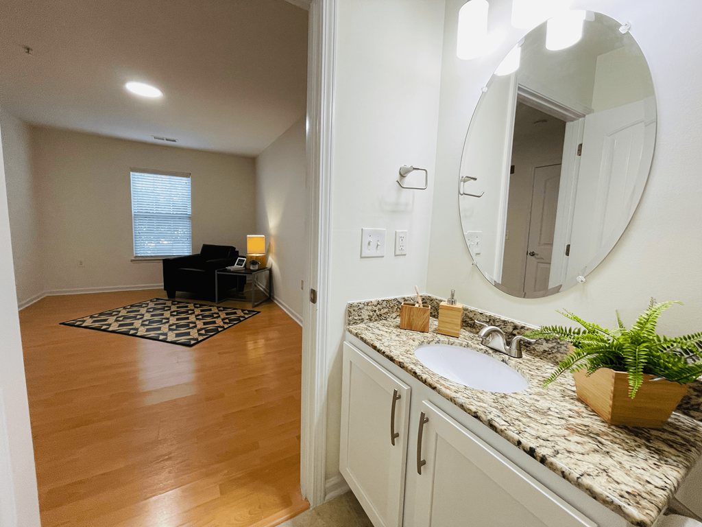 Bedroom with private bathroom at Oasis at Twinwood in Wilmington, NC