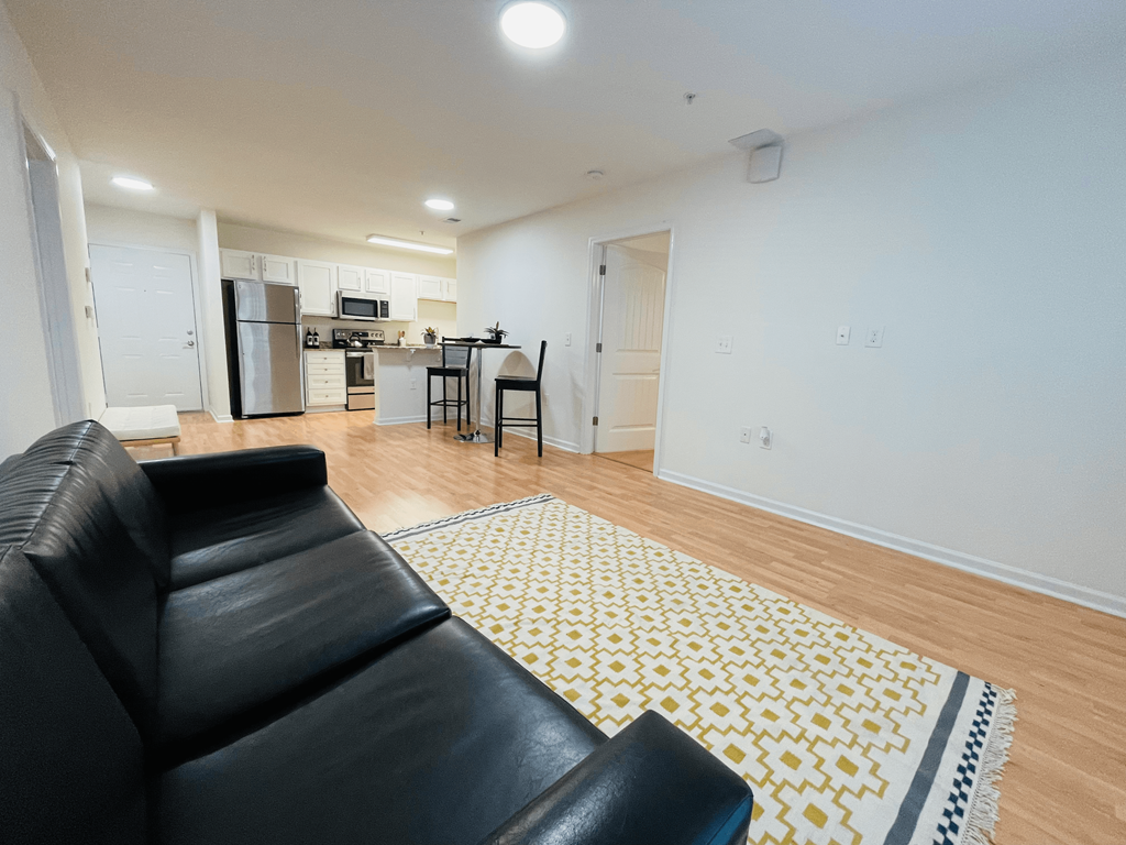 Open-concept living space at Oasis at Twinwood in Wilmington, NC