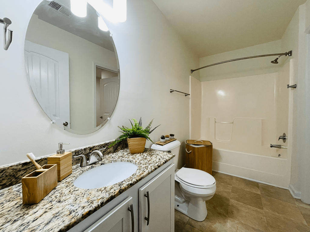 Bathroom with beautiful counters at Oasis at Twinwood in Wilmington, NC
