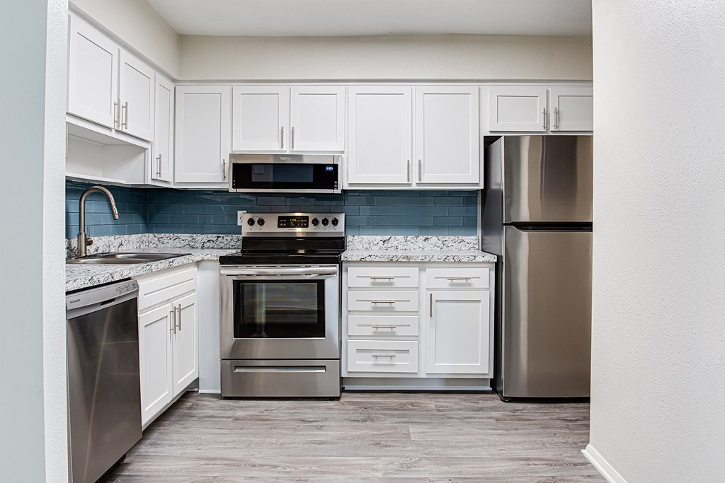 Kitchen with appliances at Parks At Utoy Creek, Georgia