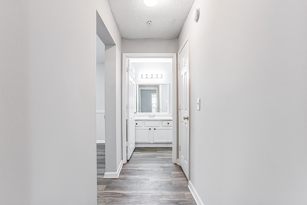 Hallway with wood like flooring Hallway with wood like flooring at Parkside at Sandy Springs Atlanta, GA