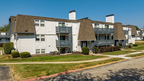 a view of the exterior of a building at the whispering winds apartments in pearland