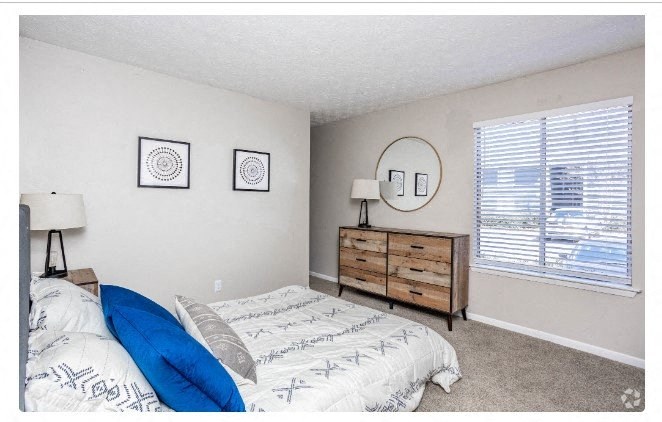 Bedroom with cozy bed1at The Landing At Pleasantdale, Doraville