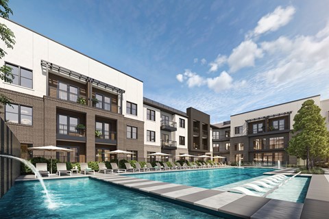A modern apartment complex with a pool in the foreground.