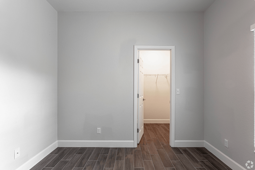 Bedroom With Closet at Waters Edge Apartments, Lakeland, Florida