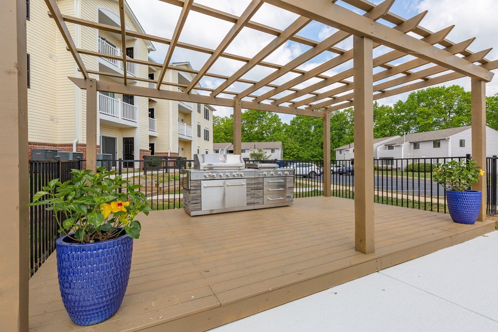 patio with grill and pergola