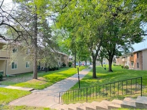 A residential area with houses and trees.