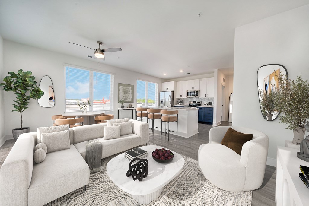 a living room with couches and a table